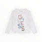 T-shirt logo paillettato Guess
