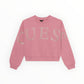 Felpa crop rosa con strass Guess